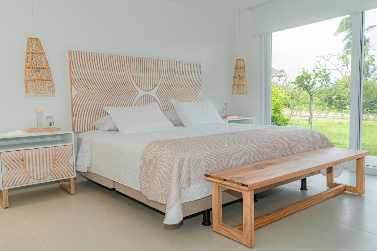 Tanusas Retreat & Spa Puerto Cayo Exteriör bild